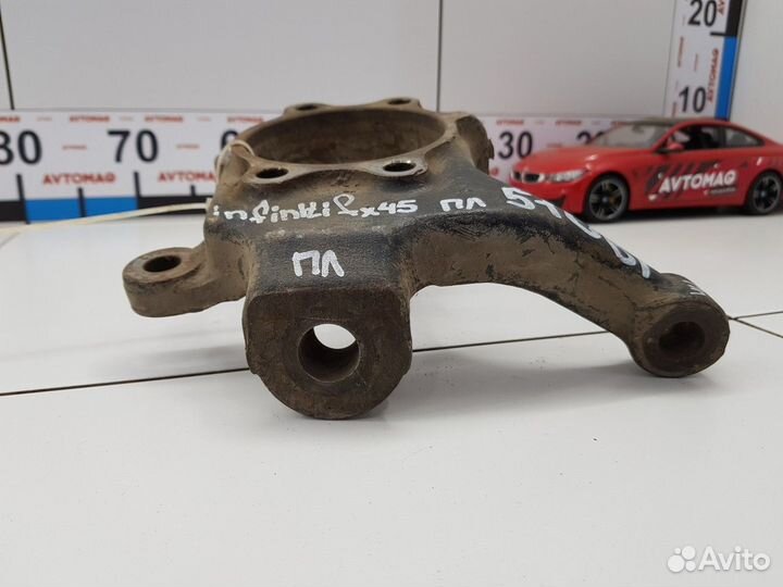 Кулак поворотный передний левый