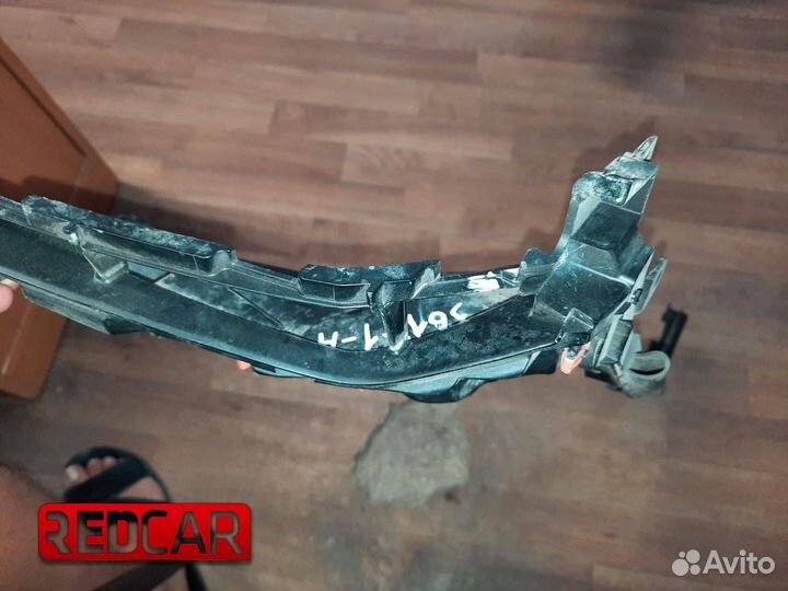 Кронштейн крепления фары лев Toyota Land Cruiser P