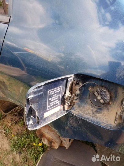 Лючок бензобака Mitsubishi Lancer 9