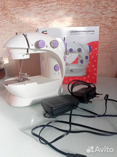 Электрическая швейная машинка