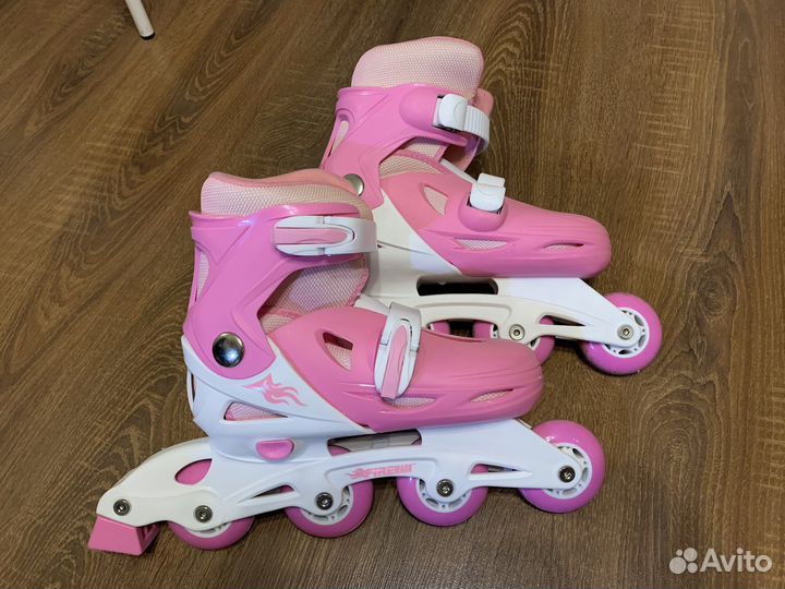 Роликовые коньки