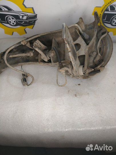 Задний левый кулак в сборе Mitsubishi Lancer 9 CS3