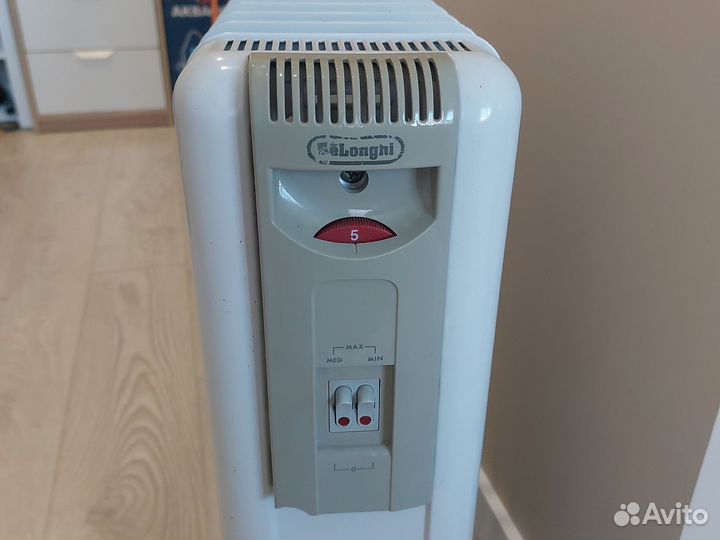 Масляный обогреватель delonghi