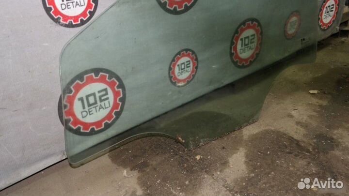 Стекло двери переднее левое Opel Astra H