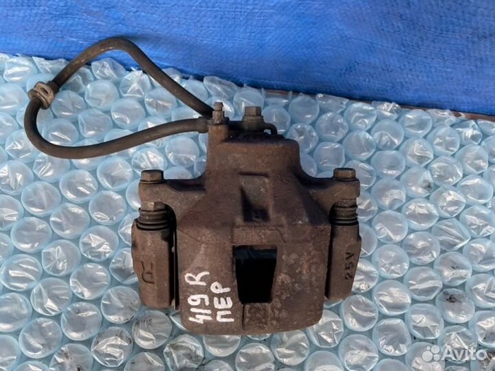 Суппорт передний правый Toyota Celica T230 2zzfe