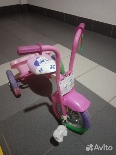Трёхколёсный велосипед с козырьком для девочки