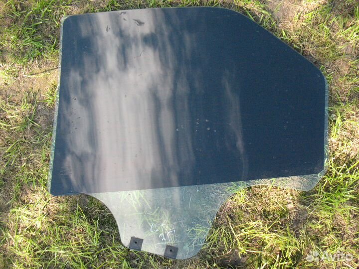 Стекло задней двери Renault Logan