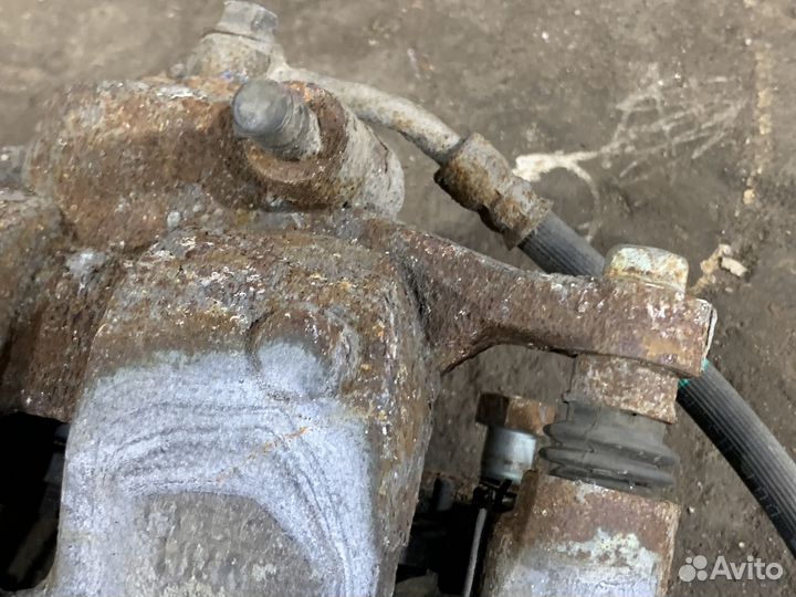 Суппорт передний левый KIA K5 DL3