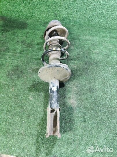 Стойка передняя правая Nissan Almera G15