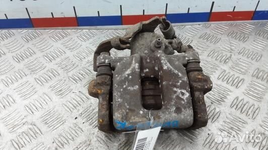 Суппорт тормозной задний правый toyota corolla E15