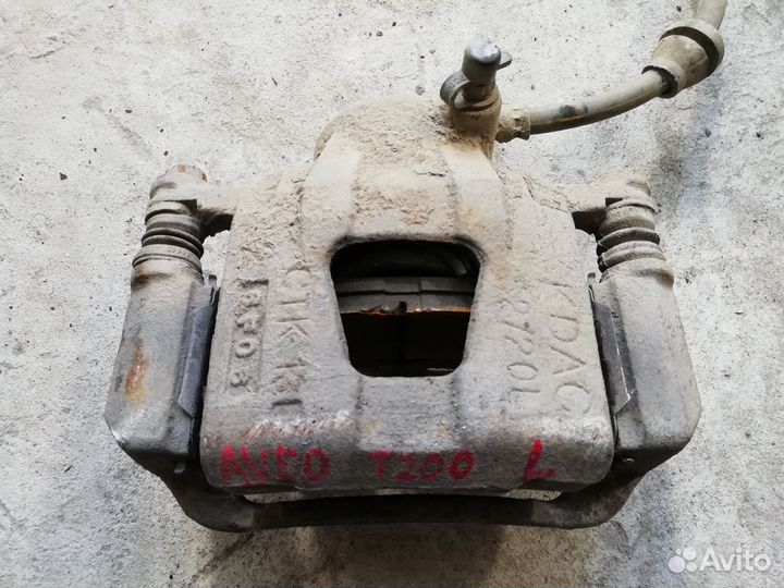 Суппорт передний левый Шевроле Авео Т200