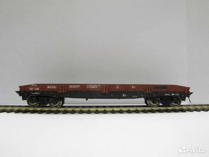 Платформа с металлическими бортами 63т. сжд