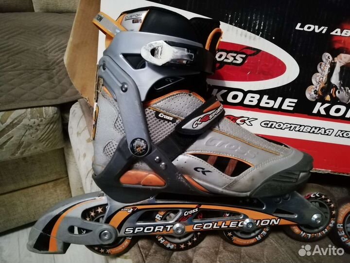 Роликовые коньки