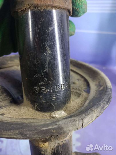 Стойка амортизатора передняя Kia Sportage 2