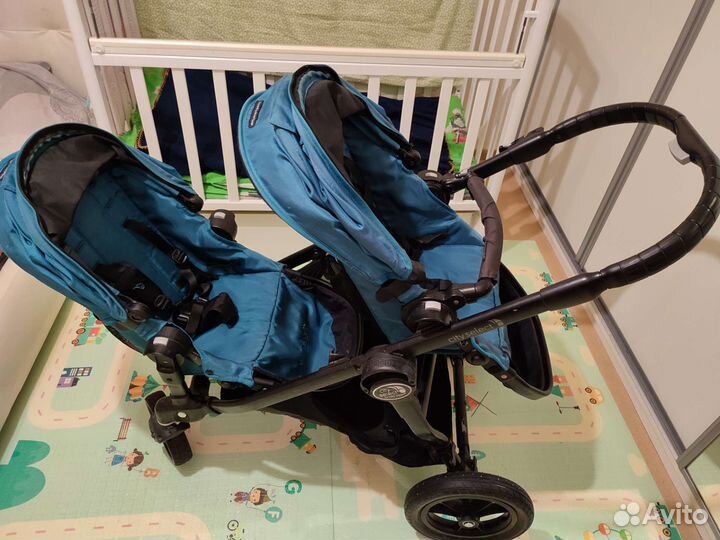 Коляска для двойни / погодок Baby Jogger