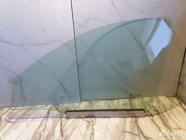 Стекло двери переднее левое Opel 1999