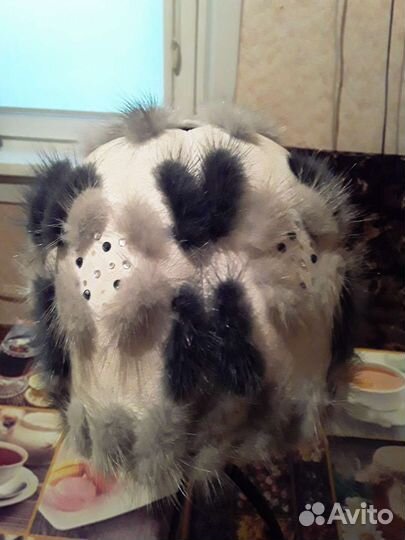 Женские меховые шапки