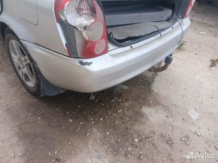 Бампер задний Mazda 323 BJ