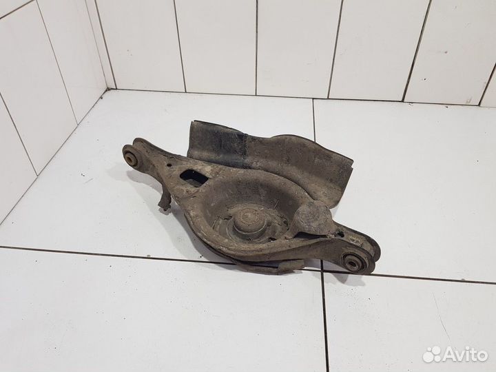 Рычаг подвески задний левый под пружину