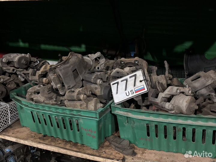 Суппорт тормозной левый Chevrolet Lanos