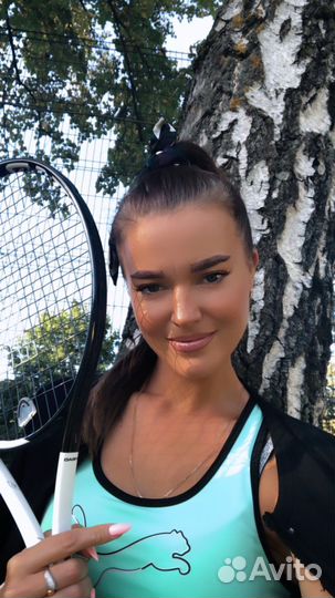 Тренер по большому теннису