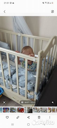 Детская кроватка с маятником и ящиком