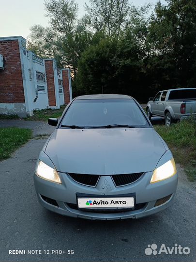 Mitsubishi Lancer 1.3 МТ, 2003, битый, 313 000 км