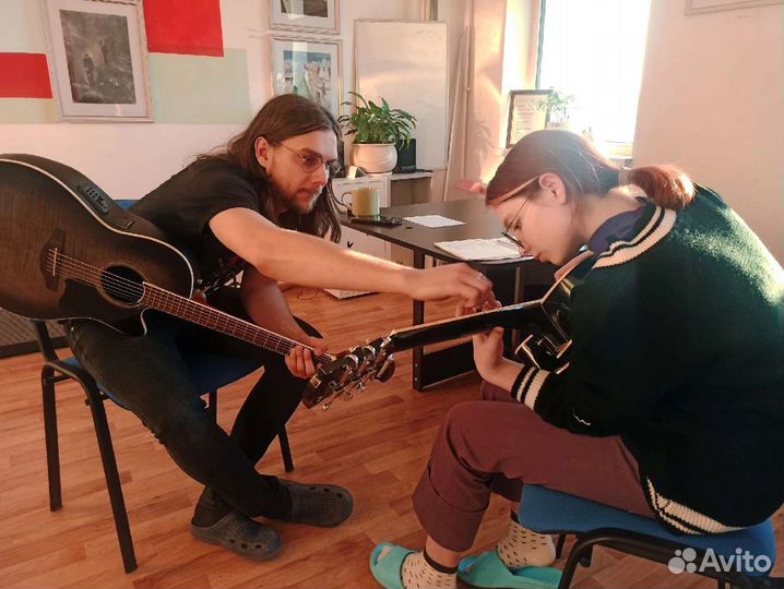 Обучение игре на гитаре