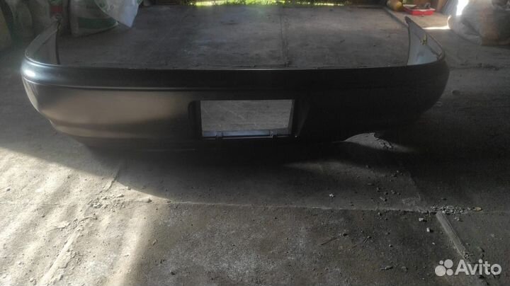 Бампер задний тойота карина