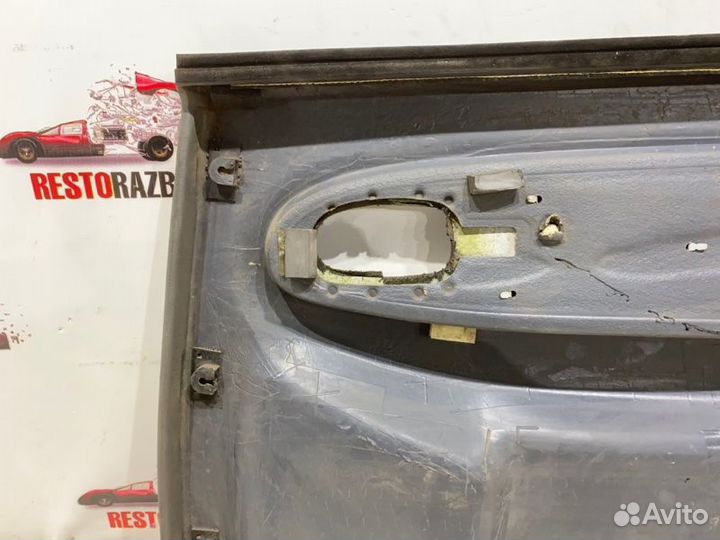 Обшивка боковой двери задняя левая Kia Spectra
