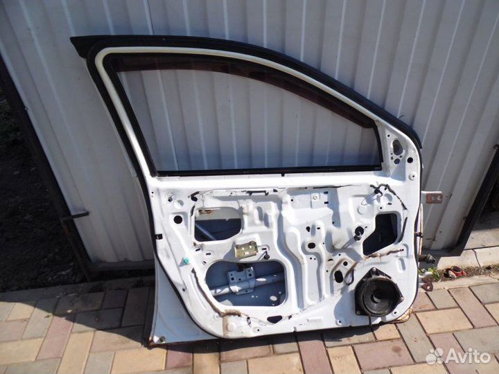 Дверь задняя левая Geely Mk 2010