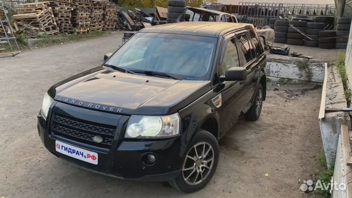 Стекло двери передней левой Land Rover Freelander