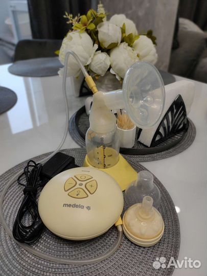 Молокоотсос medela электрический