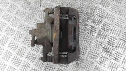 Суппорт тормозной передний правый opel astra J (LE