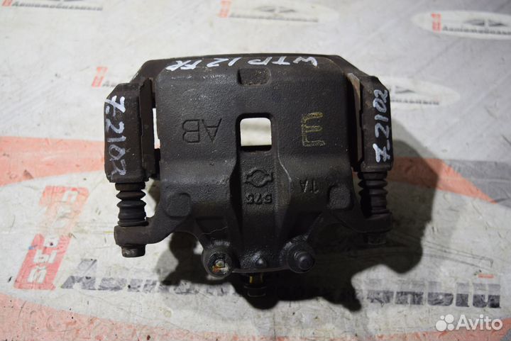 Суппорт перед право c Nissan Primera QP12 QG18DE