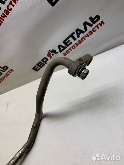 Трубка кондиционера Nissan Almera N16 седан 1.5