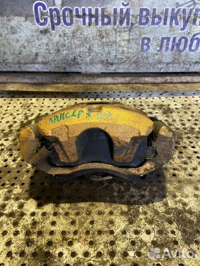 Суппорт передний правый Mitsubishi Lancer 10