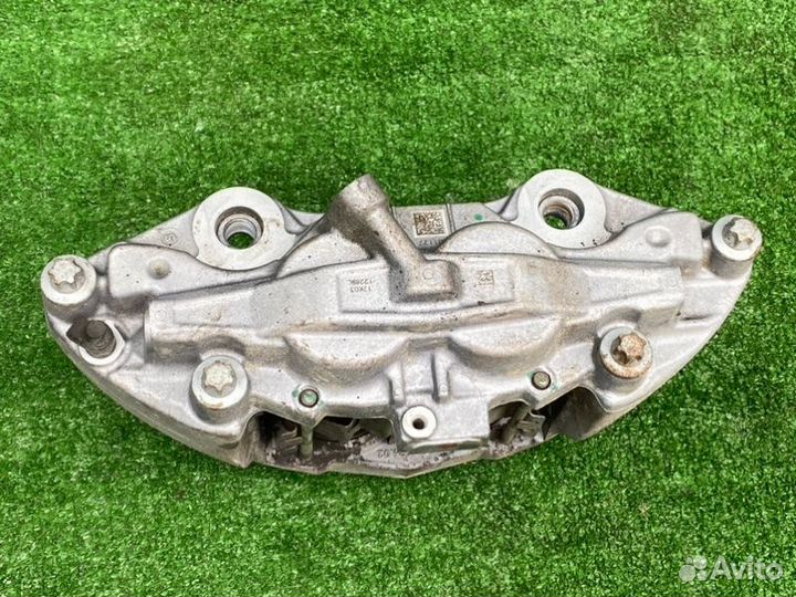 Суппорт тормозной передний левый Mercedes-Benz