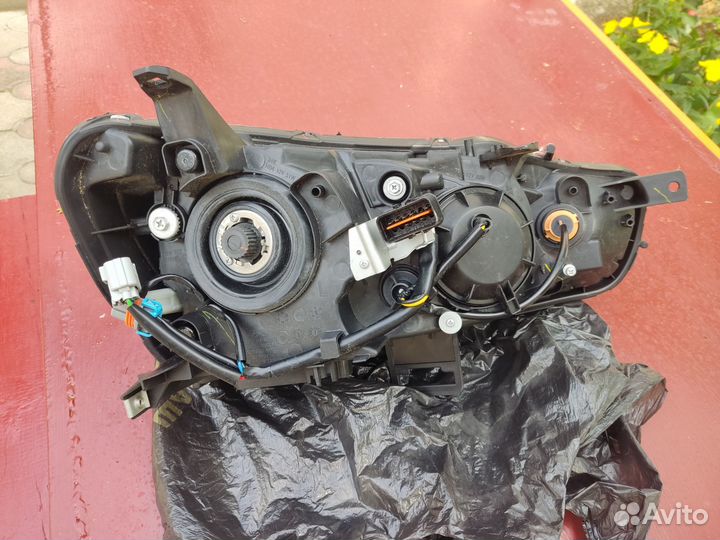 Левая передняя фара lancer 10