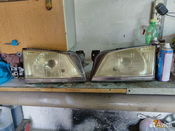 Фары передние Mazda Demio