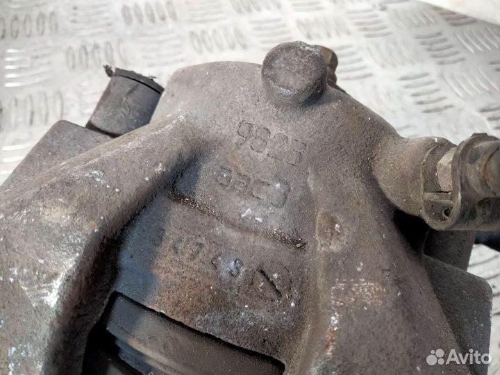 Суппорт передний левый Opel Astra H