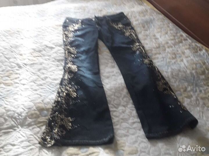 Джинсы новые