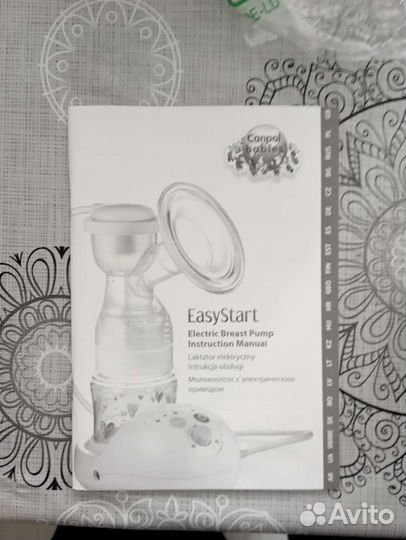 Молокоотсос электрический новый