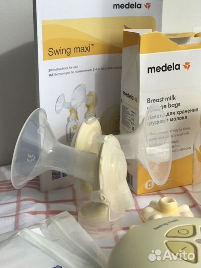 Двойной электрический молокоотсос Medela