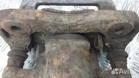 Суппорт тормозной задний правый KIA sportage 2 (EM