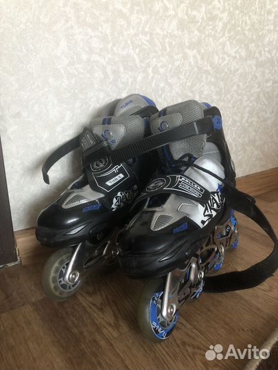 Роликовые коньки