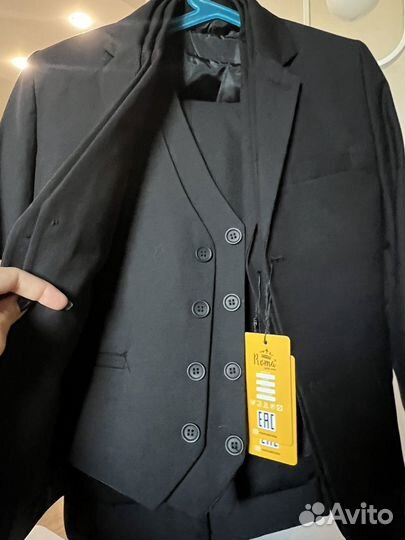 Костюм для мальчика новый 116,122,128,134