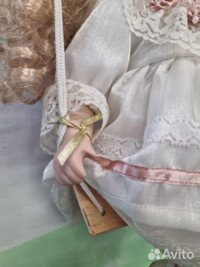 Фарфоровая кукла на качелях. Артикул34469