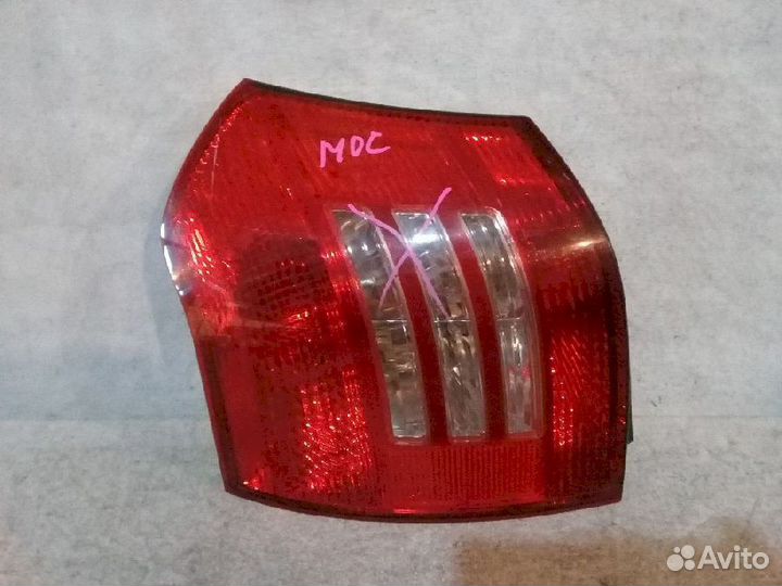 Фонарь (стоп сигнал) левый 13-77 Toyota Corolla Ru