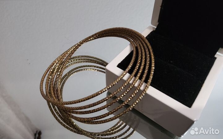 Браслет из 5 колец под золото.Бижутерия